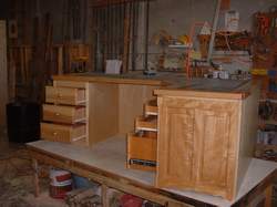 Ash desk with raised panel finished end.