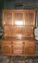 Red oak china hutch without the glass in the upper doors.
