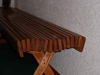 Red oak bench with a comfortable curve